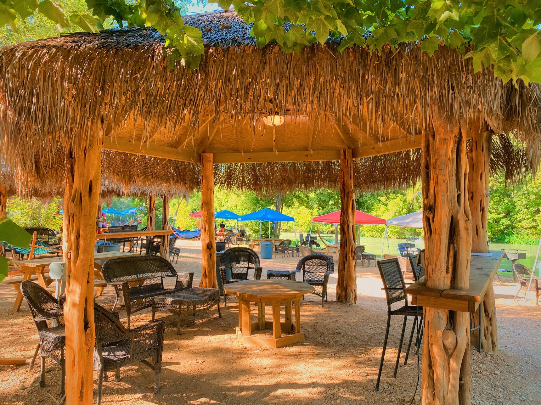 Riverside cabana with seating area