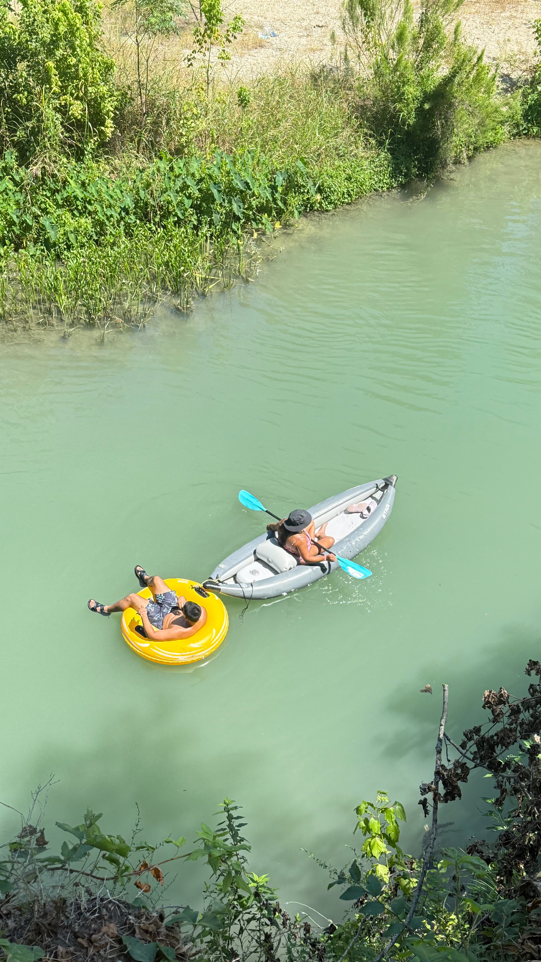 Kayaking and tubing on the river from above