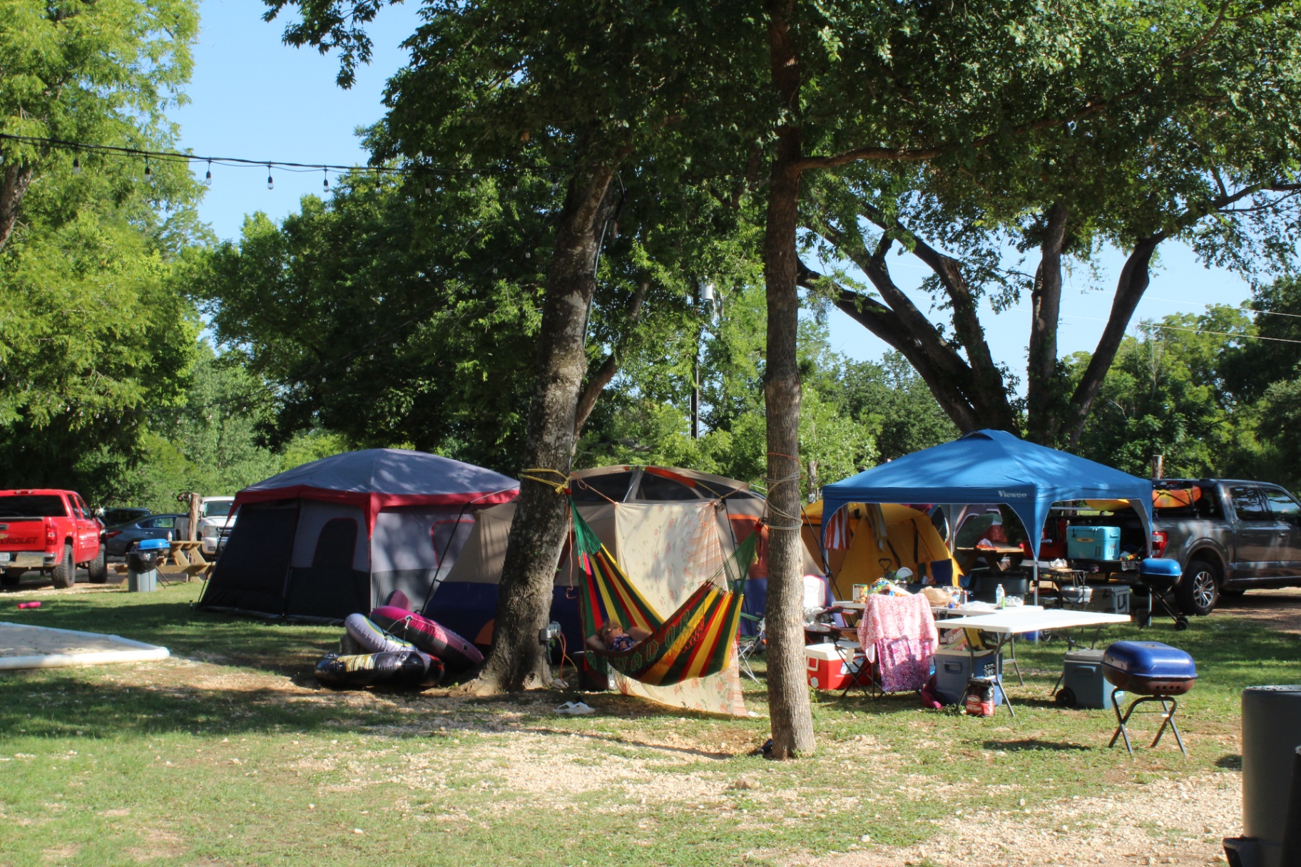 Multiple tents with hammock and canopy